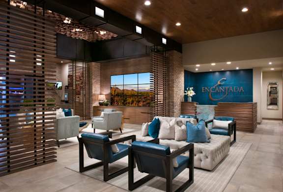 A modern living room with a sofa set and a coffee table.