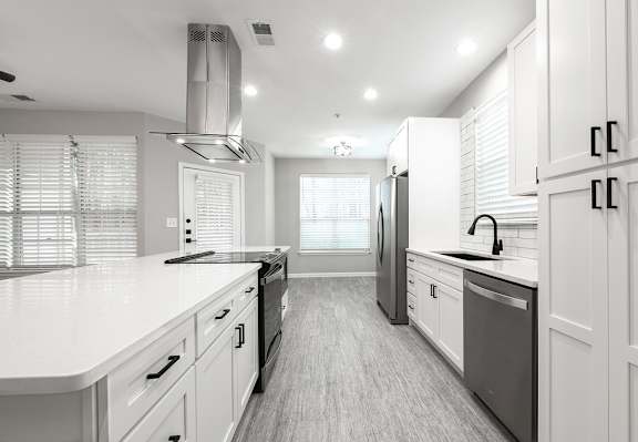 Newly renovated suites include quartz countertops, stainless steel appliances and matte black finishes and hardware (Legacy)