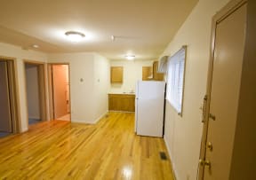 Living room and kitchen with hardwood floors