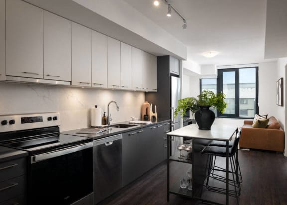 a kitchen with a counter top and a sink
