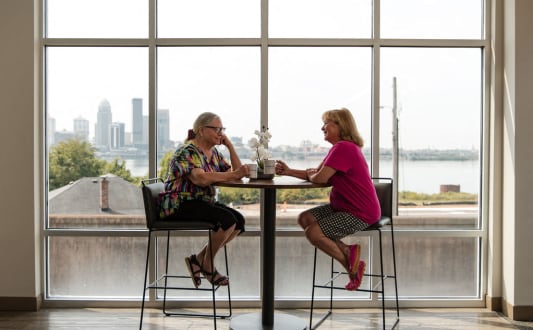 women talking and drinking coffee at Current812, Clarksville, IN 47129