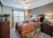 Thumbnail 7 of 16 - Bedroom with ceiling fan and light with lamp  at Amberleigh Bluff, Knoxville, 37922