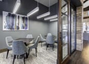 Thumbnail 3 of 8 - a conference room with a table and chairs