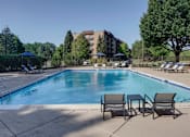 Thumbnail 7 of 41 - Outdoor pool with lounge chairs