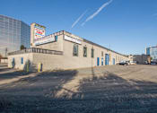 Thumbnail 3 of 6 - A building with a sign that says "Vacant Free" on it.