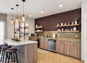 Thumbnail 23 of 30 - Pines of Burnsville - Clubhouse Kitchen