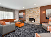 Thumbnail 25 of 30 - Pines of Burnsville - Clubhouse Seating Area & Fireplace