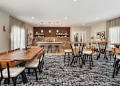 Thumbnail 8 of 30 - Pines of Burnsville - Clubhouse Seating Area & Kitchen