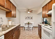 Thumbnail 5 of 30 - The Pines of Burnsville - Kitchen and Dining Room