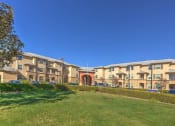 Thumbnail 3 of 22 - Grass area below community at VINTAGE AT BOUQUET CANYON, Santa Clarita, 95405