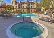 Thumbnail 13 of 22 - Spa and Pool with lounge chairs at VINTAGE AT BOUQUET CANYON, California, 91350