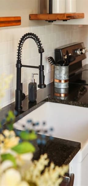 a kitchen with a sink and a counter top