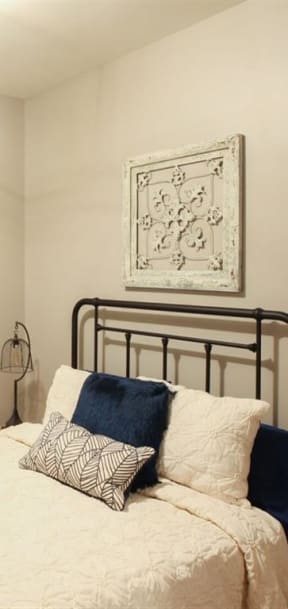 a bedroom with a bed and a closet