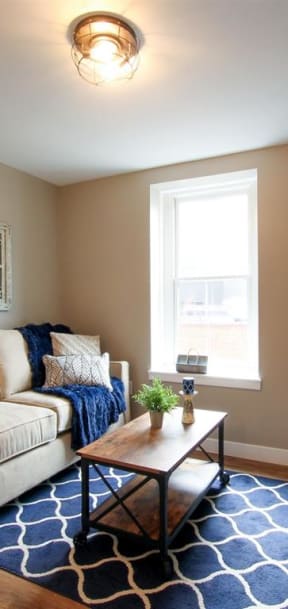 a living room with a couch and a table