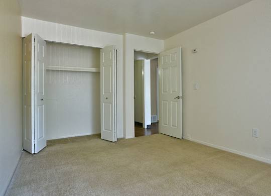 Bedroom with Carpeting at Woodland Place, Midland, MI
