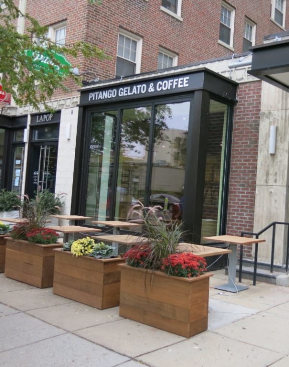 a view of the front of the cafe from the sidewalk at 1841 Columbia Road Apartments, Washington, Washington DC