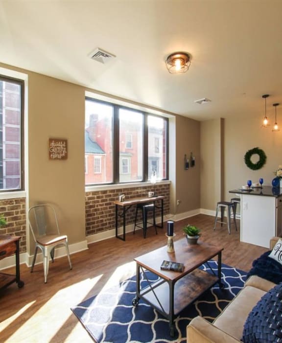 a living room with a couch and a table