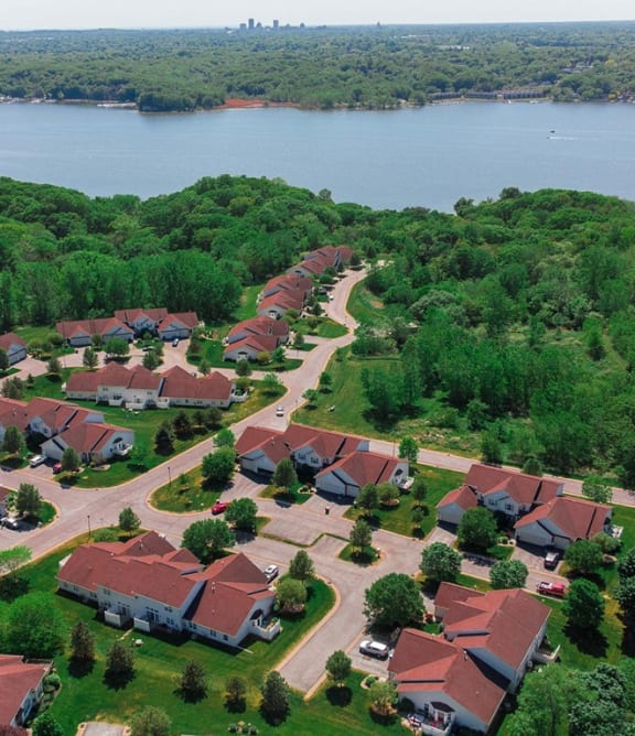 Aerial view of Waterview Townhouse Apartments, looking west over Irondequoit Bay towards the city of Rochester