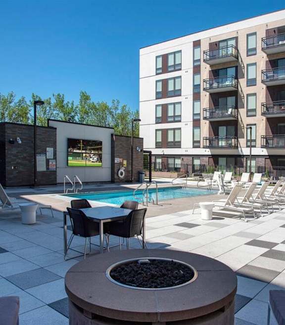 Poolside patio with firepit at Arcata Apartments, Minnesota, 55416