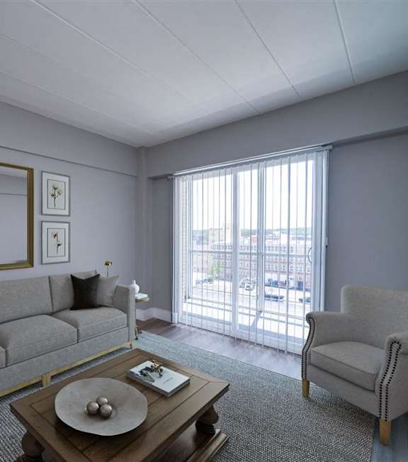a living room with a couch and a table