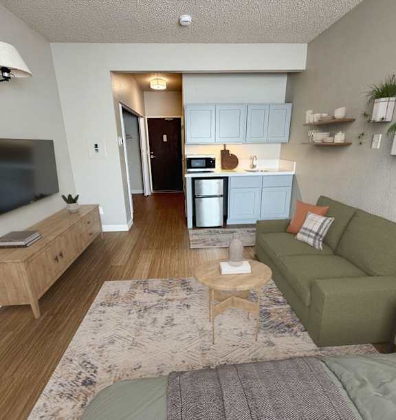 A row of townhouses with a sign that says at LSOP-Lakeside, LLC Apartments, Reno, NV