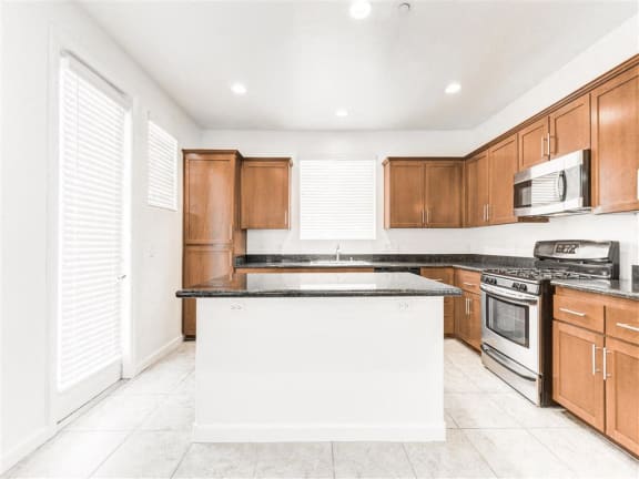 Spacious kitchens with granite countertops and ample storage at The Croix Townhomes in Henderson, NV offers 2 and 3 bedroom Townhomes!