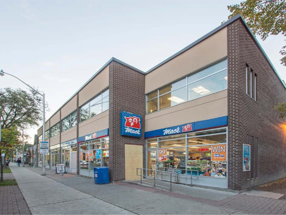 A storefront with a blue sign that says "MADE" on it.