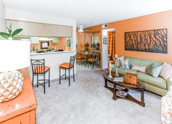 Pass through kitchen to living room of Country Club at Valley View Senior Apartments in Las Vegas, NV, For Rent. Now leasing 1 and 2 bedroom apartments.