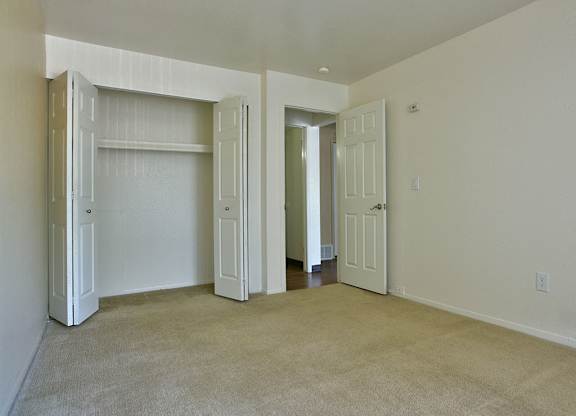 Bedroom with Carpeting at Woodland Place, Midland, MI