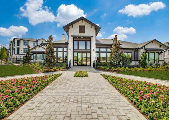 Front Facade of property entrance at The Gregory Apartments, Texas