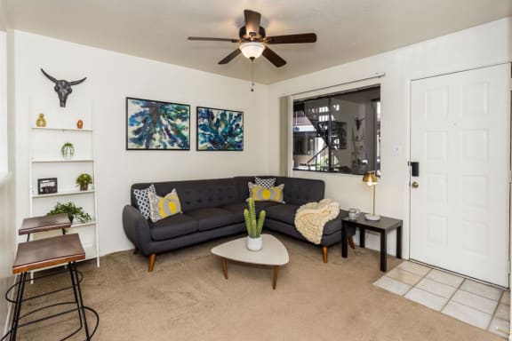 Living Room With Ceiling Fan at University Square Apartments, Arizona