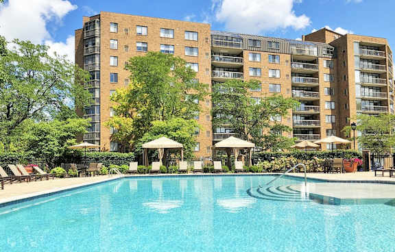 Pool with cabanas and sunshelf