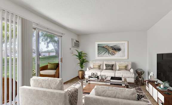 carpeted living room with large sliding glass door and patio