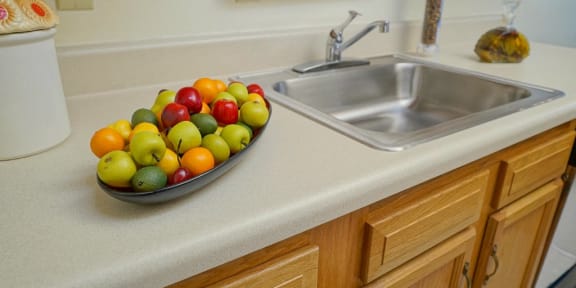 Bowl of fruit on the counter stock image
