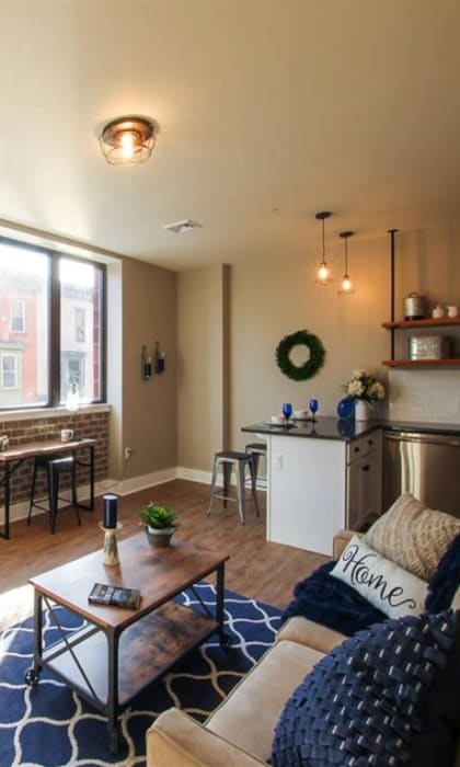 a living room with a couch and a table