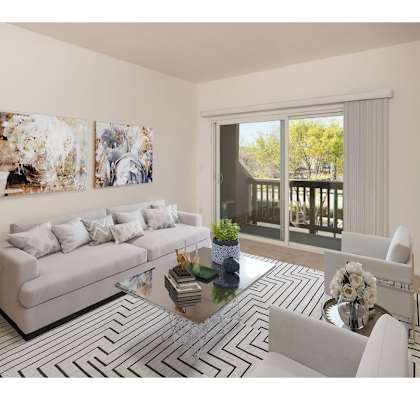 a living room with a couch and a table