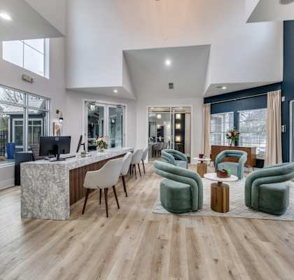 a living room with a bar and chairs and a kitchen  at Vibe on Riverside, Austin, Texas