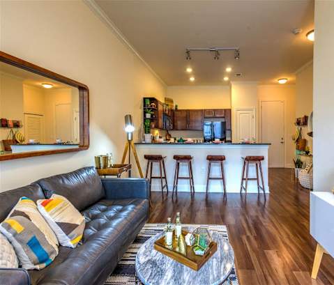Living Room With Kitchen at Lake Lofts at Deerwood, Jacksonville