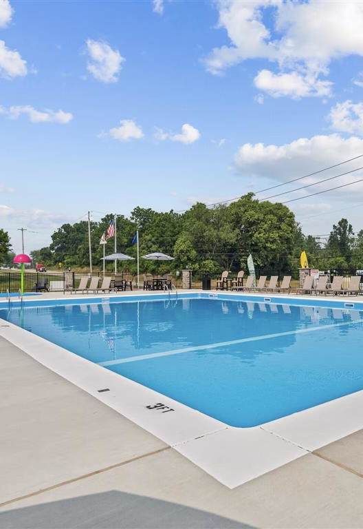 the swimming pool at our apartments has a blue pool