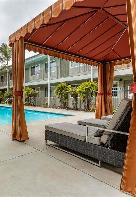 Swimming pool with Cabana and lounge chairs