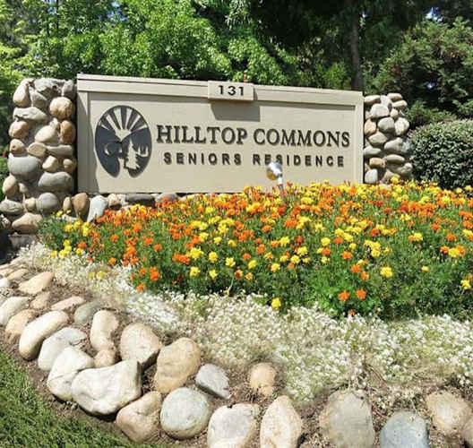 a sign for the hilltop commons denton regional park at Hilltop Commons Senior Living, California