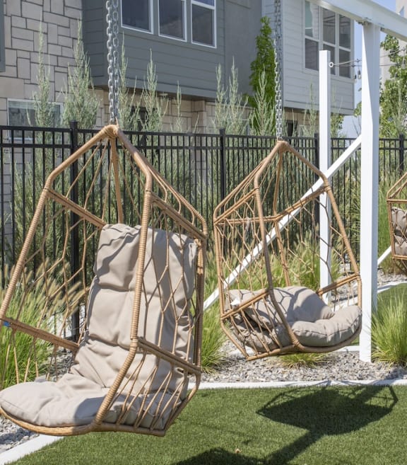 Egg Chairs by Pool at The Austin Townhomes