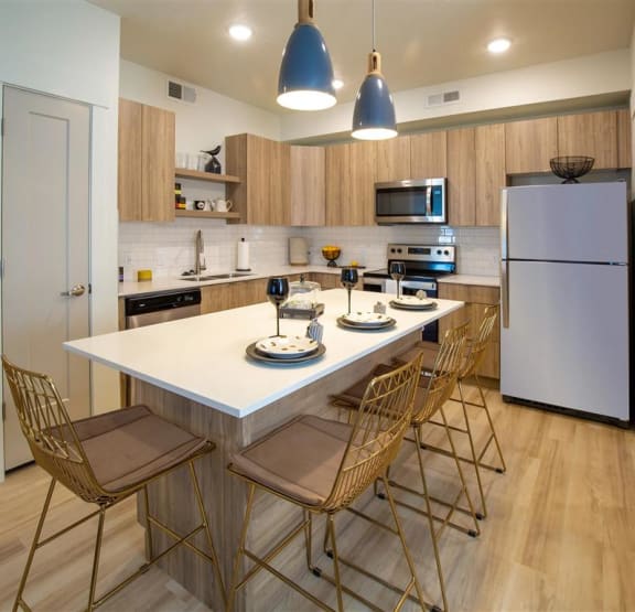 a kitchen with a large counter and a sink