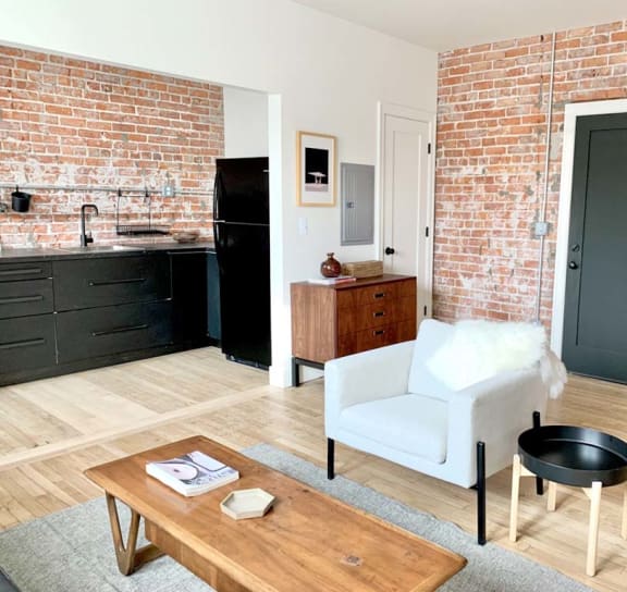 a bedroom with a bed and a door to a bathroom