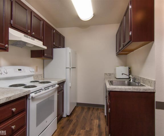 The Outlook Apartment kitchen with new appliances