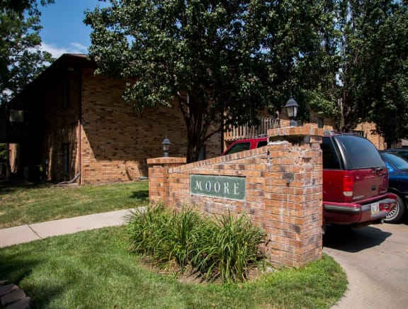 Sign entrance at Moore Place Apartments in Lincoln Nebraska