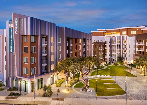 Exterior courtyard at dusk at Embark Apartments in Fremont CA