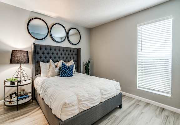 Spacious bedroom with natural light at The Melville Apartments