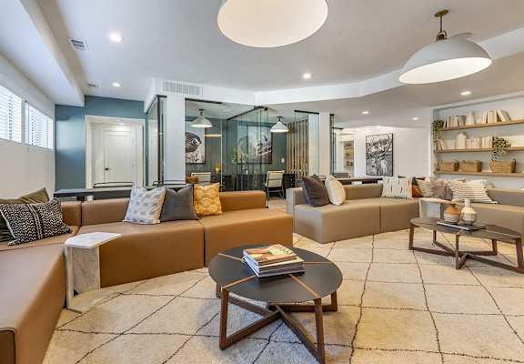 a living room with couches and a coffee table