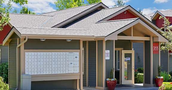 A building with the number 355 on it  at THE MEADOWS BY VINTAGE, Bellingham, WA